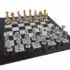 Ensemble Louis XIV Echiquier en Marbre Noir et Blanc et Pieces Echecs en Laiton Plaqué Or et Argent Bois Patiné